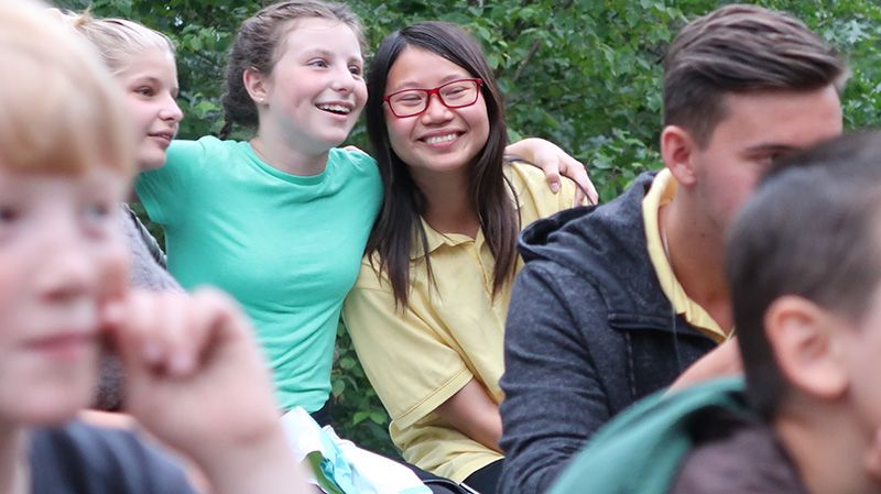 Teen camp girls sharing in Summer camp
